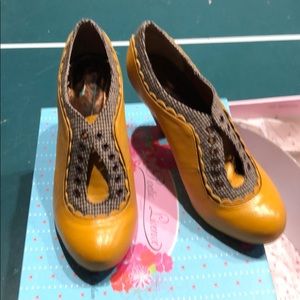 Poetic license black lash yellow shoes